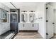 Modern bathroom with double vanity, walk-in shower, and stylish tile at 6808 Rose Petal Ave, Las Vegas, NV 89130