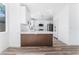 Modern kitchen with white shaker cabinets and quartz countertops at 6808 Rose Petal Ave, Las Vegas, NV 89130