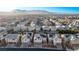 Aerial view of neighborhood with houses and mountain backdrop at 7131 Rosecrans St, Las Vegas, NV 89166