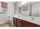 Bathroom with double vanity and mirror at 7131 Rosecrans St, Las Vegas, NV 89166