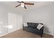 Bedroom with a couch and double door closet at 7131 Rosecrans St, Las Vegas, NV 89166