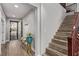 Bright entryway with tile flooring and staircase at 7131 Rosecrans St, Las Vegas, NV 89166