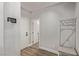 Bright hallway with wood floors and coat rack at 7131 Rosecrans St, Las Vegas, NV 89166