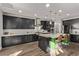 Sleek kitchen with dark cabinetry and quartz countertops at 7131 Rosecrans St, Las Vegas, NV 89166