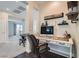 Upstairs home office features built-in shelving and a view into a spacious bedroom at 7337 Savannah Falls St, Las Vegas, NV 89131