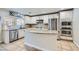 Modern kitchen with granite countertops and stainless steel appliances at 7337 Savannah Falls St, Las Vegas, NV 89131