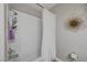 Clean bathroom with shower/tub combo and white subway tile at 7420 Bush Garden Ave, Las Vegas, NV 89129