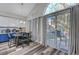 Kitchen breakfast nook with patio access and wood flooring at 7420 Bush Garden Ave, Las Vegas, NV 89129