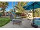 Relaxing pool area with lounge chairs and umbrellas, perfect for entertaining at 7420 Bush Garden Ave, Las Vegas, NV 89129