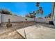 Small backyard with fire pit and desert landscaping at 759 Whispering Palms Dr, Las Vegas, NV 89123