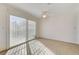 Bright dining area with tile floors and sliding glass doors leading to patio at 759 Whispering Palms Dr, Las Vegas, NV 89123