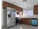 Kitchen with stainless steel appliances and teal dishwasher at 759 Whispering Palms Dr, Las Vegas, NV 89123