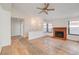 Bright living room with hardwood floors and fireplace at 759 Whispering Palms Dr, Las Vegas, NV 89123