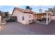 Covered patio with seating, grill, and desert landscaping at 848 Waterloo Dr, Henderson, NV 89002