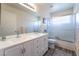 Bathroom with double sinks and a large mirror at 848 Waterloo Dr, Henderson, NV 89002