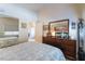 Bedroom with dresser and view into another room at 848 Waterloo Dr, Henderson, NV 89002