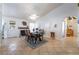 Bright dining room featuring a glass table and fireplace at 848 Waterloo Dr, Henderson, NV 89002