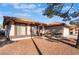 One-story house with a tile roof, and a landscaped front yard at 848 Waterloo Dr, Henderson, NV 89002