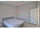 Spacious bedroom with wood-look floors and an updated door at 8517 Soneto Ln, Las Vegas, NV 89117