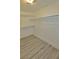 Large walk-in closet with ample shelving and hanging space at 8517 Soneto Ln, Las Vegas, NV 89117