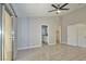 Main bedroom with sliding glass doors to backyard and ensuite bathroom at 8517 Soneto Ln, Las Vegas, NV 89117