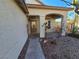 Welcoming front entry with covered porch and landscaping at 865 Gleamstar Ave, Las Vegas, NV 89123