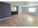 Spacious game room with wet bar and tile flooring at 865 Gleamstar Ave, Las Vegas, NV 89123