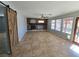 Living room boasts a fireplace and sliding barn door at 865 Gleamstar Ave, Las Vegas, NV 89123