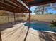 Inviting pool and spa with pergola and patio area at 865 Gleamstar Ave, Las Vegas, NV 89123