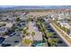 Wide aerial view of neighborhood with house and pool visible at 8986 Lillyhammer Ct, Las Vegas, NV 89147