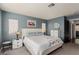 Spacious bedroom with a king-size bed and plenty of natural light at 8986 Lillyhammer Ct, Las Vegas, NV 89147