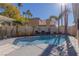 Sparkling blue pool with surrounding patio at 8986 Lillyhammer Ct, Las Vegas, NV 89147