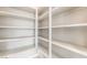 Well-organized pantry with multiple shelves offering ample storage space at 9247 Lunar Phase St, Las Vegas, NV 89143