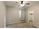 Spacious bedroom with ceiling fan and walk-in closet at 9428 Noble Fir Ridge Ave, Las Vegas, NV 89143