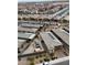 Aerial view of a house with a pool and solar panels, in a new development community at 9465 White Fir Grove Ct, Las Vegas, NV 89143