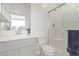 Bathroom with shower, toilet, and vanity at 9465 White Fir Grove Ct, Las Vegas, NV 89143