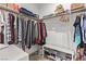 Large walk-in closet with shelving and hanging rods at 9465 White Fir Grove Ct, Las Vegas, NV 89143