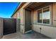 Front entrance with dark green door and brick walkway at 9465 White Fir Grove Ct, Las Vegas, NV 89143