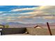 Backyard view with mountain range in the distance at 9465 White Fir Grove Ct, Las Vegas, NV 89143