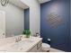 Modern bathroom with a blue accent wall at 3957 Little Creek Ave, Las Vegas, NV 89141