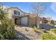 Two-story house with stone accents and a two-car garage at 3957 Little Creek Ave, Las Vegas, NV 89141