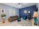 Bright living room features stylish furniture and a modern color scheme at 3957 Little Creek Ave, Las Vegas, NV 89141