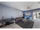 Spacious loft area with comfortable seating and home gym at 3957 Little Creek Ave, Las Vegas, NV 89141