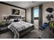 Cozy bedroom with stylish decor and window at 10130 Sequoia Glen Ave, Las Vegas, NV 89166