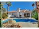 Relaxing kidney shaped pool with rock feature and grill at 1028 Norellat Rd, Henderson, NV 89011