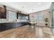 Bright dining area with wood floors and access to backyard at 12617 New Providence St, Las Vegas, NV 89141