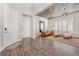 Bright entryway with wood-look floors and an open view to the living room at 12617 New Providence St, Las Vegas, NV 89141