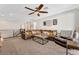 Living room with sectional sofa and mountain views at 12617 New Providence St, Las Vegas, NV 89141