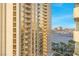 High-rise balcony with city and distant mountain views at 135 E Harmon Ave # 1005, Las Vegas, NV 89109