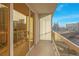 Balcony offers city views from sliding glass doors with glass railings at 135 E Harmon Ave # 1005, Las Vegas, NV 89109